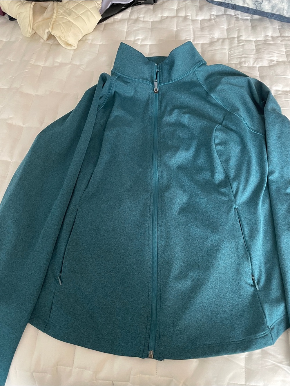Teal athletic jacket